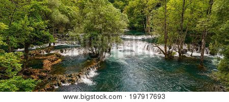 Una River. Waterfall in Martin brod. Bosna and Hercegovina. Beautiful big waterfall on the wild river.