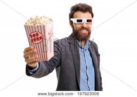 Bearded guy wearing 3D glasses and giving popcorn isolated on white background