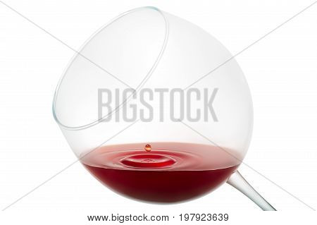 Wine drop splashing on glass isolated on white background