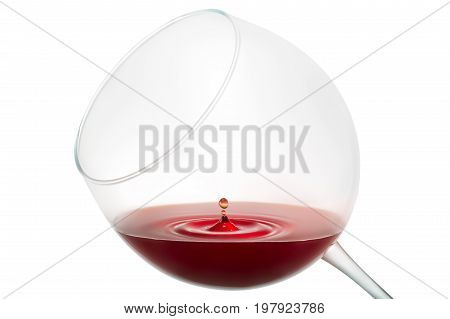 Wine drop splashing on glass isolated on white background