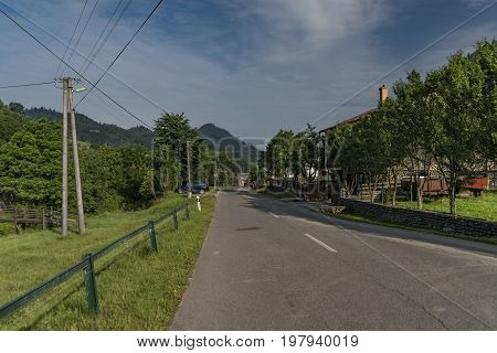 Road near Lesnica village in Pieniny national park in cold summer morning