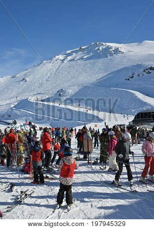 Mount Hutt New Zealand - July 30 2017: Mount Hutt Ski Field at Lunch Time. Skiers prepare to ride on the Chairlift outside the restaurant Canterbury New Zealand.