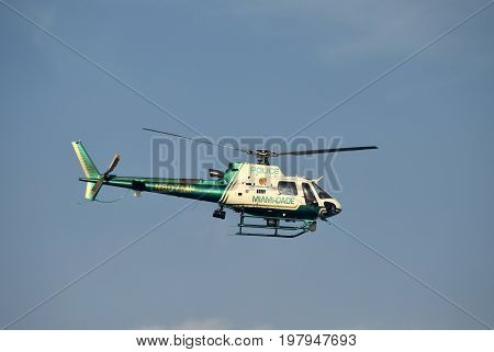 MIAMI - MARCH 27: Miami Dade County police helicopter departs on patrol over the city on March 27 2017 from its home base Opa Locka Airport