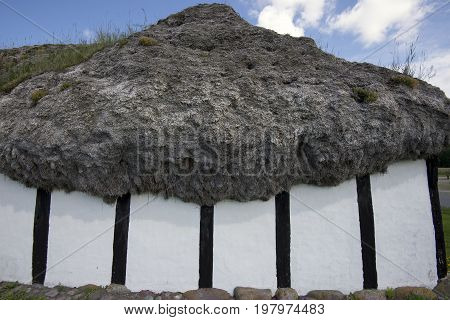 LAESOE DENMARK - JULY 26 2017: Seaweed roof farm museum called Heather Farm Laesoe 2017