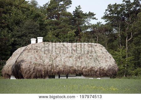 LAESOE DENMARK - JULY 28 2017: Seaweed roof house called Hedvigs House Laesoe 2017