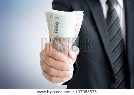 Businessman Hand Grabbing Money - Thai Baht (thb)