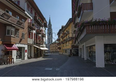 Cortina d'Ampezzo, Italy - September 24, 2011:  Autumnal corso Italia, the Church or Synagogue in the town centre of Cortina d'Ampezzo, Dolomites, Alps, Veneto, Italy, Europe, Visit in the place.