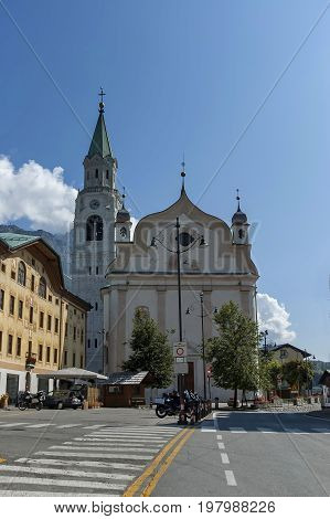 Cortina d'Ampezzo, Italy - September 24, 2011:  Autumnal corso Italia, the Church or Synagogue in the town centre of Cortina d'Ampezzo, Dolomites, Alps, Veneto, Italy, Europe. Visit in the place.