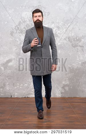 Best Coffee To Go. Trendy Man With Beard. Brutal Bearded Hipster In Denim Wear. Male Fashion Model. 