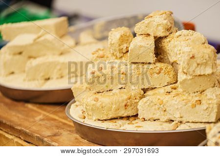 Halvah Sweet Traditional Food Dessert Made Of Nuts. Delicious Food, Tasty Healthy Snacks Concept.