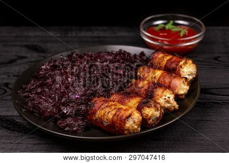 Fried Homemade Grilled Sausages Or Chevapchichi With Stewed Sauerkraut And Tomato Sauce On A Wooden 