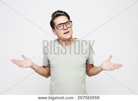lifestyle, happiness, emotional and people concept: photo of stupefied handsome male has shocked expression