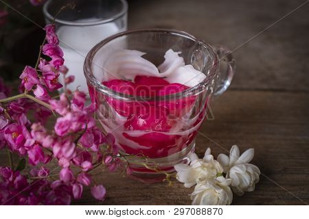 Thapthim Krop, Mock Pomegranate Seeds In Coconut And Syrup In The Glass On The Wood Table There Are 