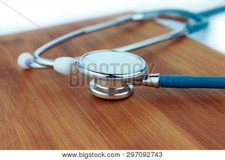 Stethoscope  On A Wood Background, Checkup, Stetoscope, Illness, Diagnosis, Instrument, Health-care,