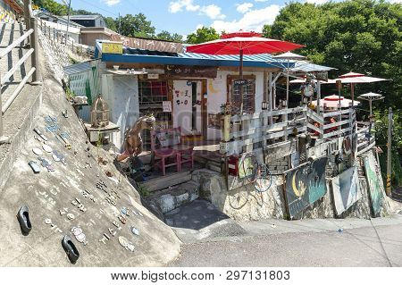 Jeonju, South Korea - September 2018: Colourful Paintings And Decorations On Walls And Buildings At
