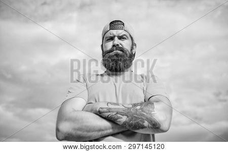 Man Bearded Muscular Brutal Hipster Outdoors Sky Background. Masculinity And Brutality. Lumbersexual