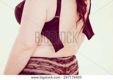Fat Woman Rear View Opening Taking Off Or Putting On Her Bra. Plus Size Overweight Female Model Wear