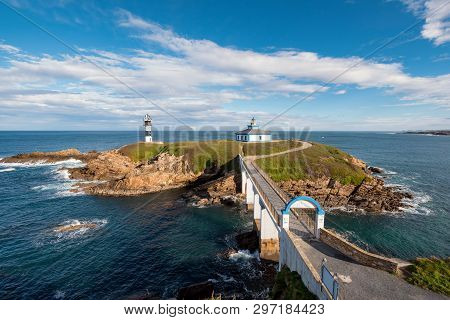 Pancha Island Lighthouse In Ribadeo Coastline, Galicia, Spain.