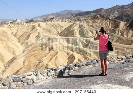 Death Valley, Usa - April 13, 2014: Tourist Takes Mobile Photos Of Zabriskie Point In Death Valley, 