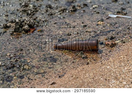 Glass Bottle  On Sea Shore