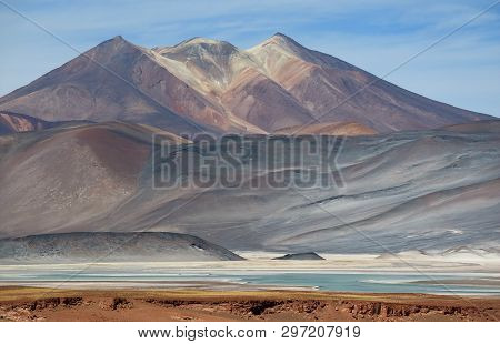 The Picturesque Cerro Medano Mountain With Salar De Talar Salt Lake In The Foreground, Atacama Deser