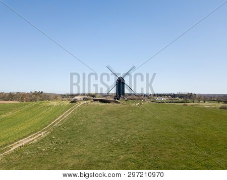 Hoejerg, Denmark - April 23, 2019: Aerial View Of The Historic Danish Windmill Called Pibe Moelle.