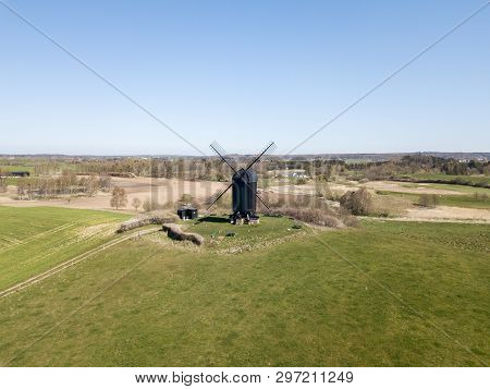 Hoejerg, Denmark - April 23, 2019: Aerial View Of The Historic Danish Windmill Called Pibe Moelle.