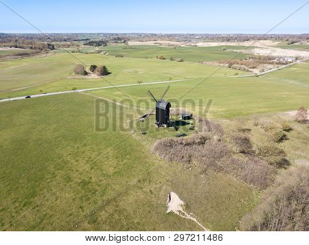 Hoejerg, Denmark - April 23, 2019: Aerial View Of The Historic Danish Windmill Called Pibe Moelle.