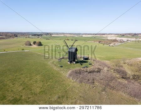Hoejerg, Denmark - April 23, 2019: Aerial View Of The Historic Danish Windmill Called Pibe Moelle.