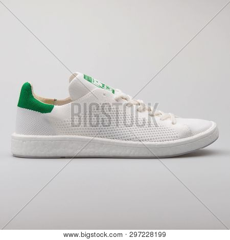 Vienna, Austria - August 7, 2017: Adidas Stan Smith Pk White And Green Sneaker On White Background.
