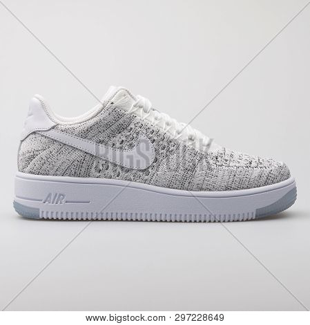 Vienna, Austria - August 7, 2017: Nike Air Force 1 Flyknit Low White And Black Sneaker On White Back
