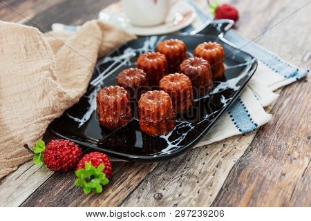 Canele is a small French pastry with rum and vanilla 