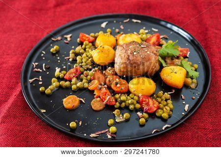 Beef meat stewed with potatoes-Traditional French cuisine Beef Bourguignon potatoes carrots in persillade