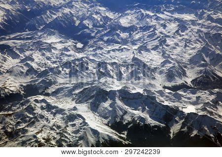 Aerial View On Mountain Peaks. European Alps