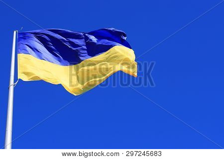 The Largest Yellow And  Blue State Flag Of Ukraine On The Flagpole  In The  Ukrainian Dnepr City, Dn