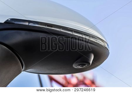 Rear View Mirror With Turn Signal And Surround View 360 Degrees Camera. Close Up. On A White Premium