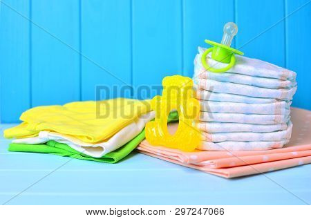Newborn Accessories: Diapers, Clothes, Soother And Teether