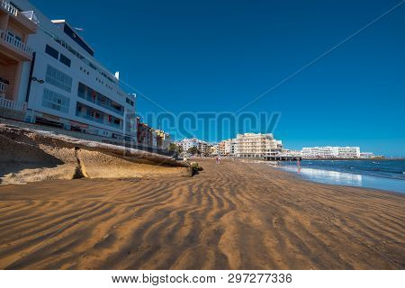 El Medano, Spain - April 11, 2018: Tourist Relaxing In El Medano Beach, Tenerife, Canary Islands, Sp