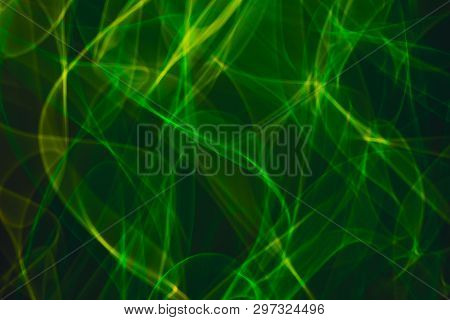 Yellow Neon And Green Neon Smoke Abstract. Neon Lines. Abstract Black Background. Neon Lights Textur