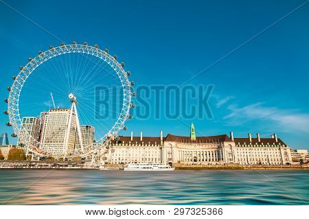 England London - April 20, 2019: London Eye Near County Hall In Summer View From Thame River Boat Cr