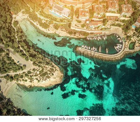 Beautiful birdeye view on the sea coastline with pier and yakhts at sunny day. Travell, jorney,islands, Seascape, freedom, holidays concept.