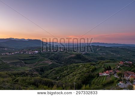 Small Village Kojsko With Chirch Križ On The Hill On Sunrise Between The Vineyards In The Wine Regio