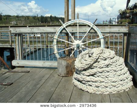 ธีมทะเลเรือล้อและเชือก