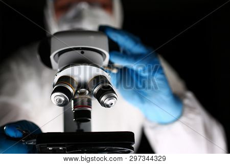 Laboratory Pharmacist Work At Optical Microscope. Scientist Working On Research With Microscopy Meta
