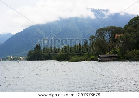A View Of Lake Tegernsee In Germany On A Cloudy Summer Day