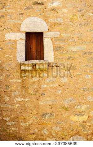 Window Frame Made Of Brown Wood. Old Construction, Ancient Architecture. Enterior Details.