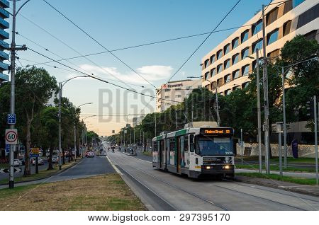 Melbourne, Australia - March 7, 2019: Trams Travelling Along Flemington Road Bisecting Parkville And
