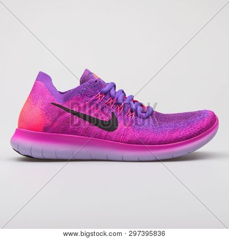 Vienna, Austria - August 7, 2017: Nike Free Rn Flyknit 2017 Pink And Purple Sneaker On White Backgro