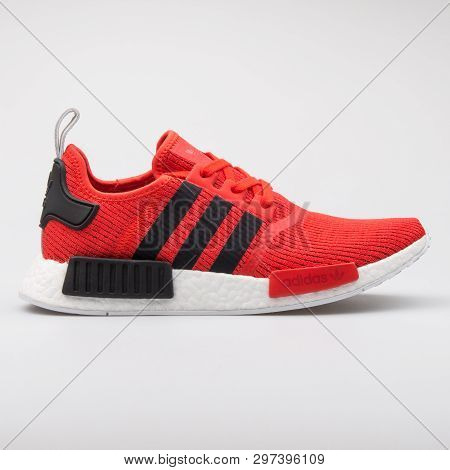 Vienna, Austria - August 7, 2017: Adidas Nmd R1 Red And Black Sneaker On White Background.