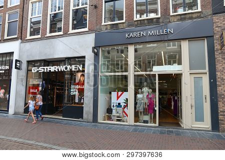 Amsterdam, Netherlands - July 8, 2017: People Shop At Leidsestraat Street In Amsterdam. Amsterdam Is